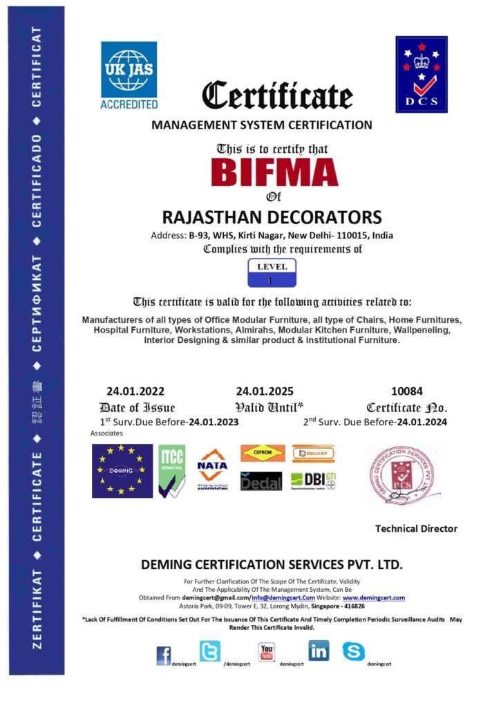 Official DCS Management System Certificate for BIFMA Level 1 compliance issued to Rajasthan Decorators in Kirti Nagar, New Delhi, featuring UK JAS accreditation, certificate number 10084, and a technical director signature stamp.