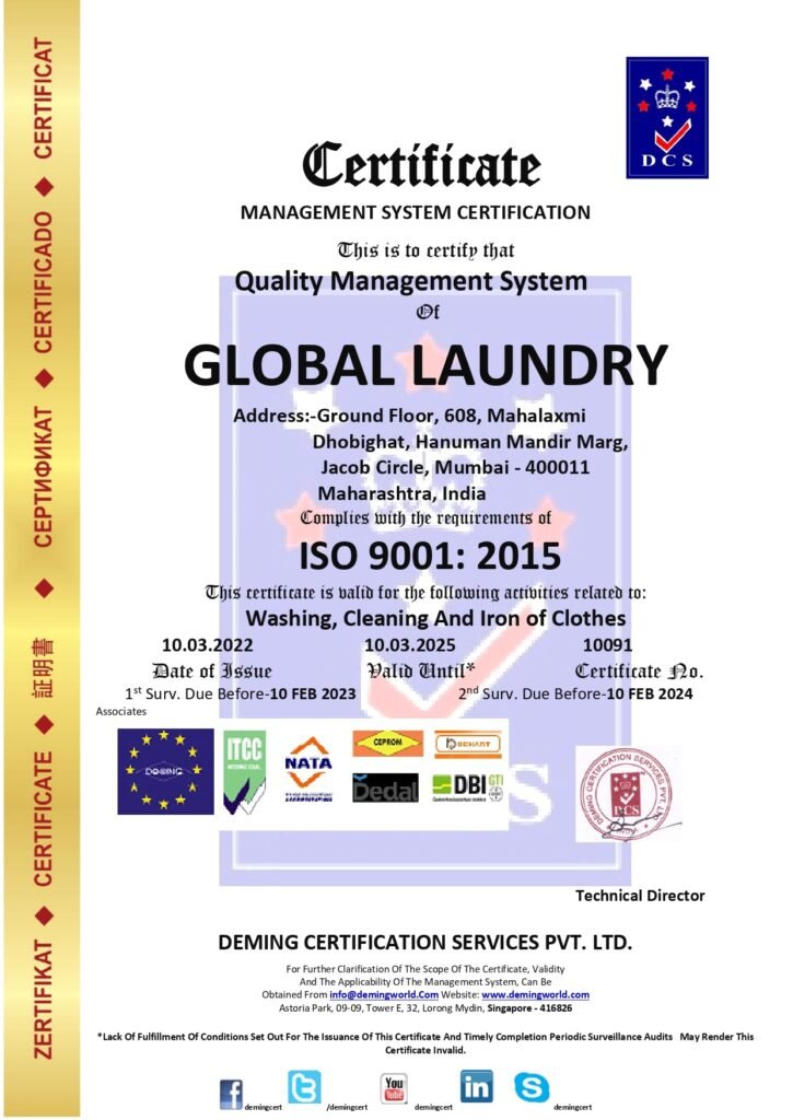 Official DCS Quality Management System Certificate issued under ISO 9001:2015 to GLOBAL LAUNDRY in Jacob Circle, Mumbai, complete with accreditation partner logos, certificate number 10091, and a technical director signature stamp.